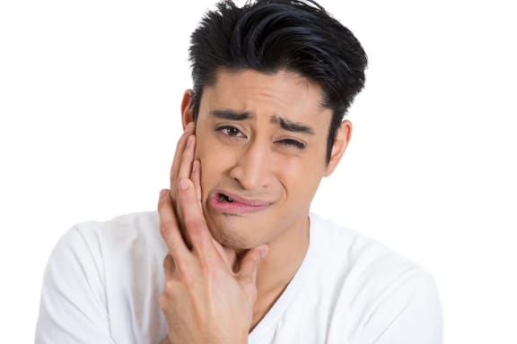 A patient experiencing tooth pain