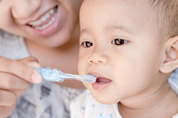 Child caring for developing teeth